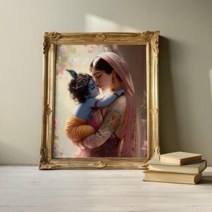 a painting of a woman holding a child, with a wooden frame surrounding the artwork. The painting is displayed on a wall, and there are some books and a stack of books visible in the foreground.