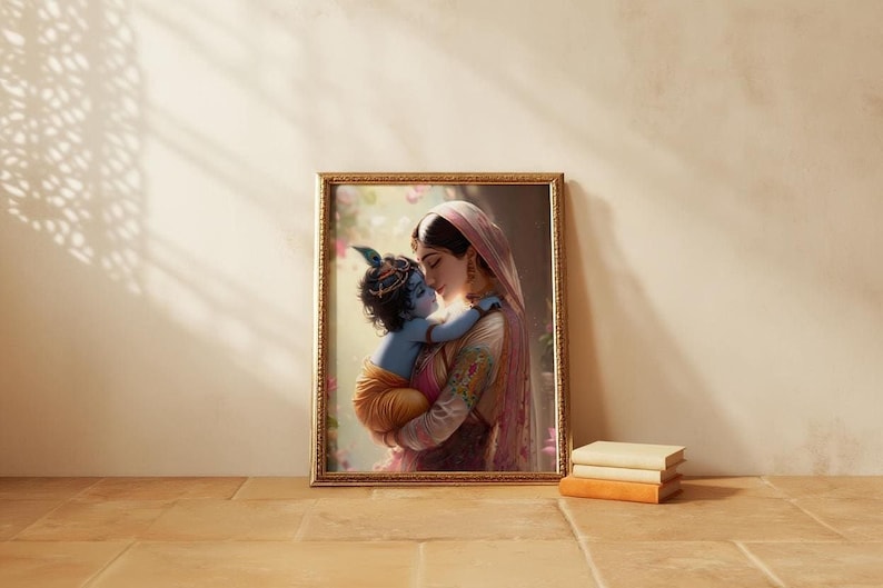 A framed image of a woman embracing a child, likely a baby, is displayed on a wall next to a stack of books.