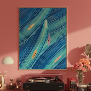May include: A framed abstract art print with blue and white brushstrokes, depicting surfers on the water. A black record player sits on a red cabinet, with a collection of vinyl records below. A lamp, flowers, and speakers complete the scene.
