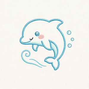 May include: An embroidery design featuring a light blue outlined dolphin with a small pink cheek and a dark blue eye. The dolphin is positioned above a swirling blue wave pattern and is accompanied by three small blue bubbles to the right side.