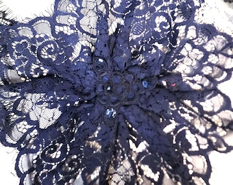 Round traditional doily with comb or clip. Beaded.