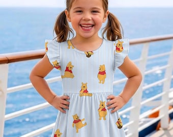 Vestido de Winnie the Pooh con estampado de tarro de miel y volantes, color azul claro, ideal para el viaje a Disneyland en 2026.
