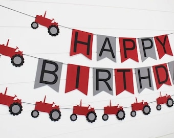 May include: Red and gray banner with the words "Happy Birthday" and red tractor cutouts.