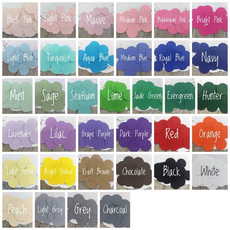 May include: A chart of 25 different colored circles with the name of each color written in white text below each circle.