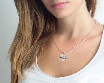 An amazing medallion necklace with And You Shall Love Medallion v’ahavta in Hebrew