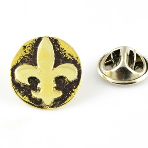 An amazing brooch pin  with the White Lily symbol medallion fleur de lis jewelry fleur de lis art