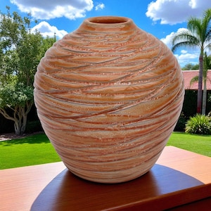 Handmade Burnt Orange Carved Ceramic Orb Vase