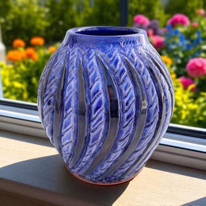 Handmade Blue Ceramic Vase: Decorative, Spherical, Ribbed Pottery