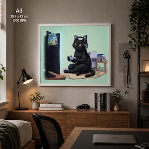 May include: Framed art print featuring a black cat gaming. The cat wears headphones and holds a controller, playing a video game on a black screen. The print is 29.7 x 42 cm (11.7 x 16.5 inches) and is displayed in a white frame.