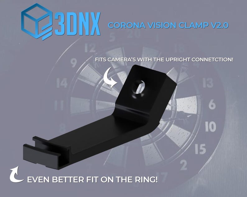 May include: A black 3DNX Corona Vision Clamp V2.0 with an angled design. Text on the image reads: 3DNX CORONA VISION CLAMP V2.0, FITS CAMERA'S WITH THE UPRIGHT CONNETCTION!, and EVEN BETTER FIT ON THE RING! The clamp features a central mounting hole.