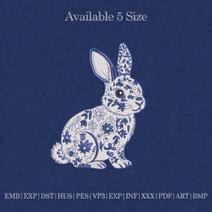 May include: A white and blue embroidered rabbit design on a navy blue background. The rabbit is decorated with floral patterns. The text "Available 5 Size" is at the top. Embroidery file formats are listed at the bottom.