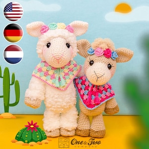 May include: Two crocheted stuffed animals, a white sheep and a brown llama, wearing colorful crocheted scarves with tassels. The sheep has a pink and blue scarf and the llama has a pink and blue scarf. The animals are standing on a yellow surface with a green cactus in the background.