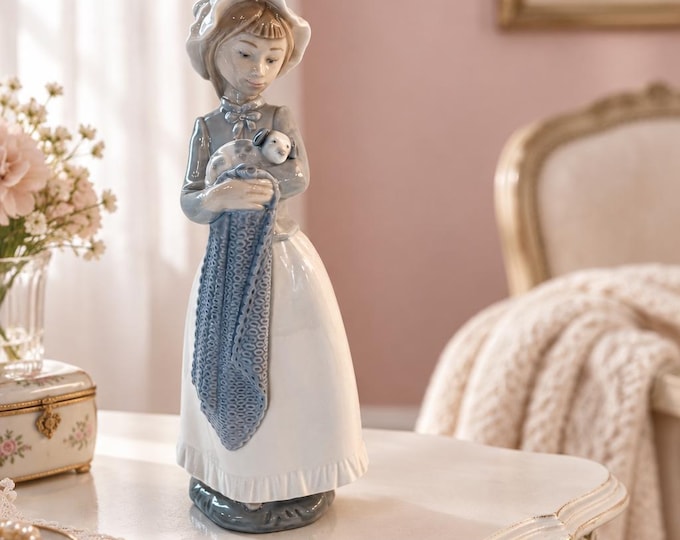 Vintage Lladro Nao porcelain figurine of a girl holding a puppy 10.5” x 4”
