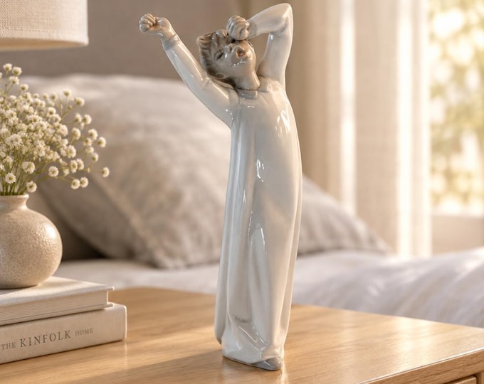 Lladro “Yawning Boy” #4870 retired Spanish porcelain figurine 9” x 4”