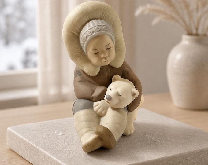Lladro matte porcelsin Eskimo child with polar bear cub 5” x 4”