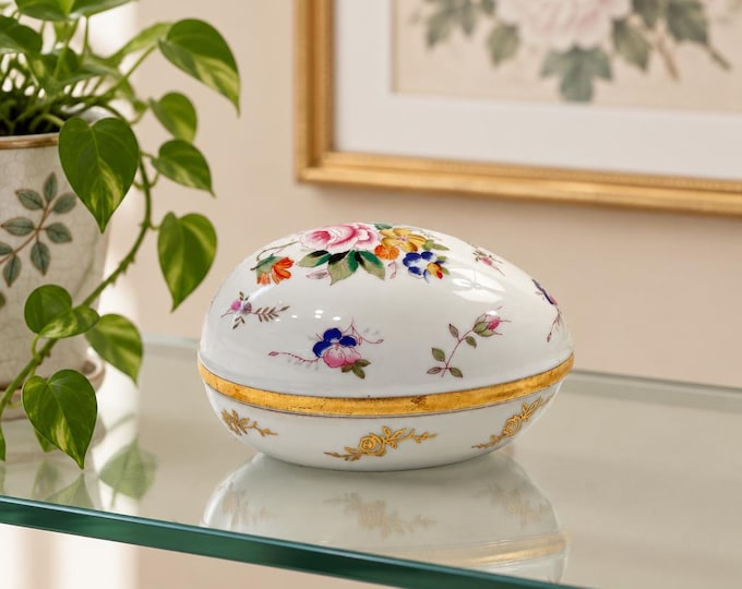 Vintage floral motif porcelain egg-shaped trinket dish with gold trim 3.5” x 5.5”