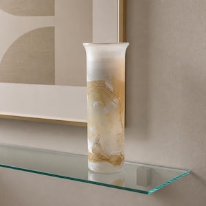 May include: A tall, cylindrical glass vase featuring a frosted finish with swirling patterns of white and golden-brown hues. The vase has a slightly flared rim and a smooth, translucent texture, showcasing a marbled appearance throughout the body.