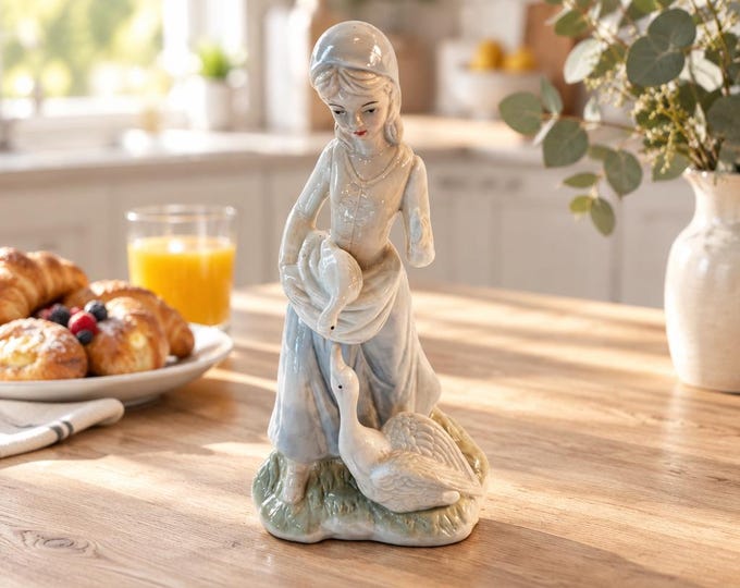 Vintage Spanish porcelain figurine of woman with geese 8.25” x 4.25”