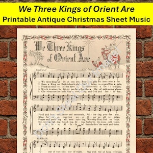 May include: Aged printable Christmas sheet music, "We Three Kings of Orient Are." The antique sheet music has musical notation and lyrics, with a decorative border. The title "We Three Kings of Orient Are" is at the top.
