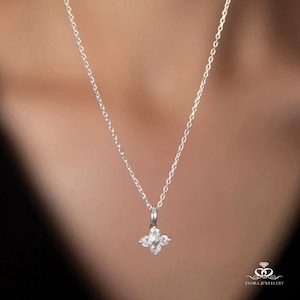 Sterling Silver Flower Pendant Necklace: Cubic Zirconia Floral Design