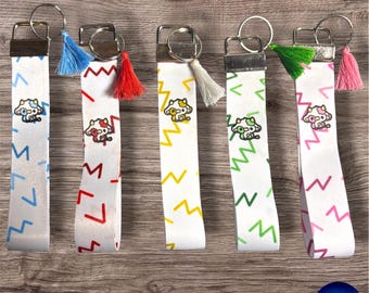 Cow Design Wristlet Keyring – Material Fob Style – Zig‑Zag Confetti Background, Sublimated, Created by Young Artist
