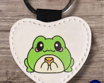 Limited Edition Frog Keyrings – Three Cute Designs – Gold Reverse, Sublimated Artwork by Neurodiverse Young Artist