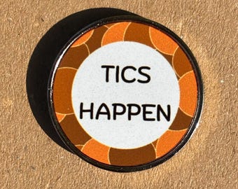 Tics Happen Pin Badge – Orange Awareness – Stainless Steel – 25 mm
