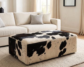 Ottoman aus schwarzem und weißem Rindsleder, großer rechteckiger Lederpouf, Couchtisch-Fußhocker aus Rindsleder, unbesetzter Pouf