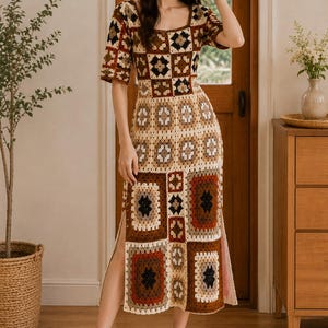 May include: A midi-length crochet dress featuring a square neckline and short sleeves. The garment is constructed from a patchwork of granny squares in a color palette of cream, tan, brown, rust, and black, with side slits at the hemline.