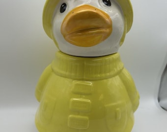 Tarro de cerámica para galletas con diseño vintage de Puddles, el pato con impermeable amarillo, de Metlox.