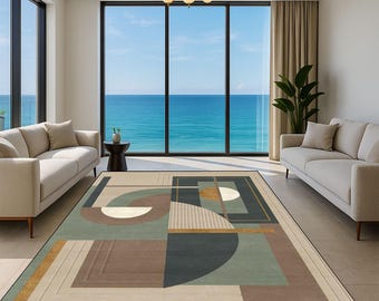 Puede incluir: Una alfombra moderna con un diseño geométrico abstracto. La alfombra presenta una mezcla de formas y colores, incluyendo marrón, beige, verde y dorado. La alfombra es rectangular y parece estar hecha de un material suave, adecuada para una sala de estar.