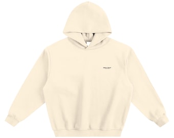 Sudadera con capucha de forro polar color crema albaricoque para hombre: sudadera gruesa y cálida con corte cuadrado moderno, un básico acogedor para el invierno.