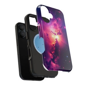 May include: A black smartphone with a protective case displaying a vivid nebula design in purple, pink, and orange hues. The case is layered, revealing the phone, a black inner case, and the outer design. The phone case has a glossy finish.