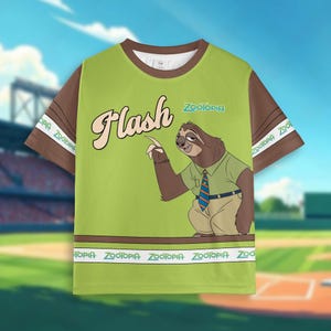 May include: Green t-shirt featuring Flash from Zootopia. The shirt has brown sleeves and a white collar. The word "Flash" is written in a cursive font above the cartoon sloth character. The Zootopia logo is visible on the shirt.