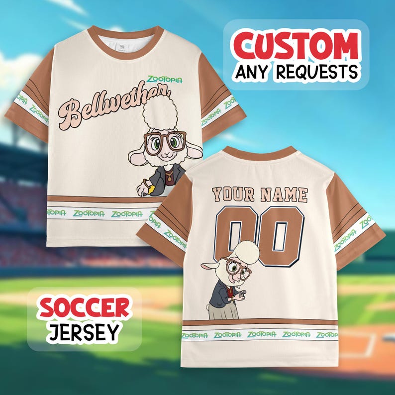 May include: Cream-colored soccer jersey featuring the character Bellwether from Zootopia. The front displays the character and the name "Bellwether" in a script font. The back has space for a name and number. Brown sleeves and trim with "Zootopia" text.