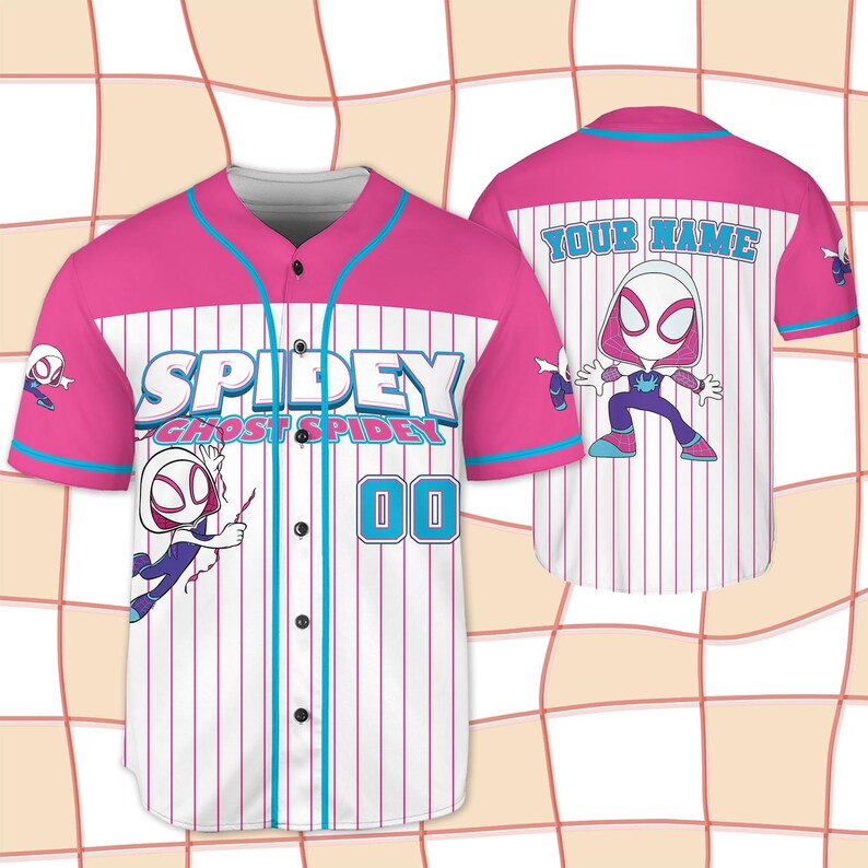 May include: A pink and white baseball jersey with the text "SPIDEY" and the number "00" on the front. The jersey features a cartoon character on the front and back, with the words "YOUR NAME" on the back.