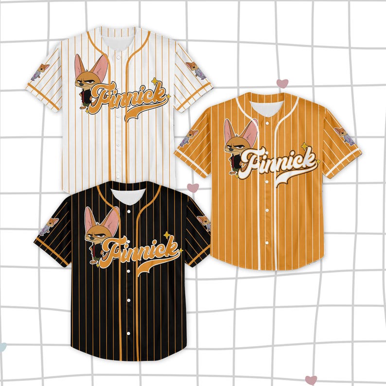 May include: Three baseball jerseys in white, gold, and black, each with vertical stripes and a cartoon fox graphic. The jerseys feature the name "Finnick" in a stylized font and are button-down with short sleeves.