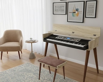 May include: A digital piano in light wood tones with a black keyboard and dark brown legs. A matching bench with a brown cushion is in front. The piano is in a room with a beige armchair, a small side table, and a patterned rug.