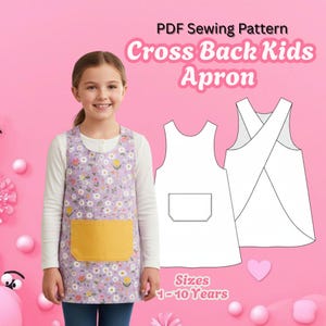 May include: A child wearing a floral print apron with a yellow pocket. The apron is part of a PDF sewing pattern for a cross-back kids apron. The text on the image reads "Cross Back Kids Apron" and "Sizes 1-10 Years."