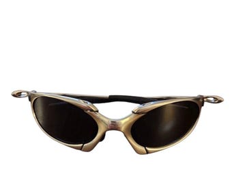 Gafas de sol Oakley Romeo 1 polarizadas, montura plateada, lentes negras. Exhibidor X-Metal no incluido.