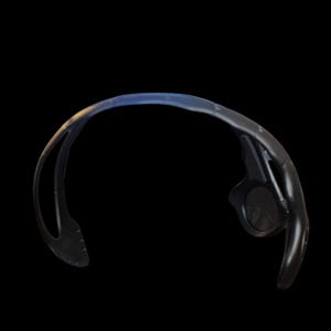 May include: Black sports sunglasses with a curved frame and a dark lens. The sunglasses have a sleek, modern design, suitable for outdoor activities. The frame appears to be made of a durable material.