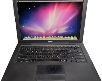 Ordinateur portable Apple MacBook A1181 noir 2006 rare et vintage