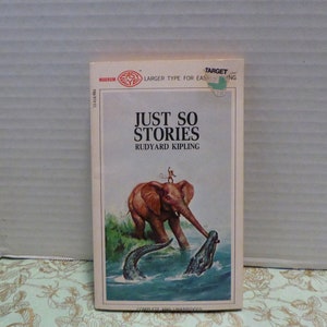 May include: A book cover with a colorful illustration of an elephant and a crocodile. The title of the book is "Just So Stories" by Rudyard Kipling.