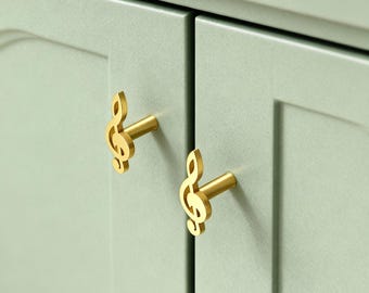 Notenknöpfe aus Messing, Griffe aus Gold, Notenschlüsselgriffe aus Messing