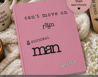 May include: A pink reading journal and book log with black text on the cover that reads: can't move on from a FICTIONAL man, and send help. A circular pink sticker at the top right reads: for fictional man survivors.