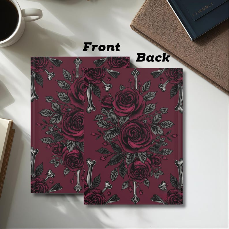 May include: Two notebooks with a burgundy cover featuring a floral design of dark red roses, gray leaves, and bone accents. The word "Front" is printed on the left notebook, and "Back" is printed on the right notebook.