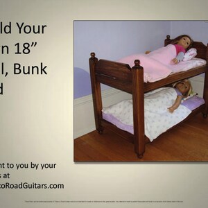 May include: A wooden bunk bed designed for 18 inch dolls. The bed is stained a dark brown and features a white and purple patterned bedding. The text "Build Your Own 18" Doll, Bunk Bed" is visible in the image. The text "Brought to you by your friends at TobaccoRoadGuitars.com" is also visible in the image.