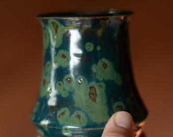 Art Deco style vase, dark blue with avocado green and copper markings