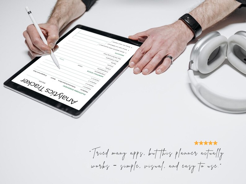 May include: A black tablet with the words "Analytics Tracker" is being used with a stylus. White headphones are on the right. The text reads: "Tried many apps, but this planner actually works - simple, visual, and easy to use."