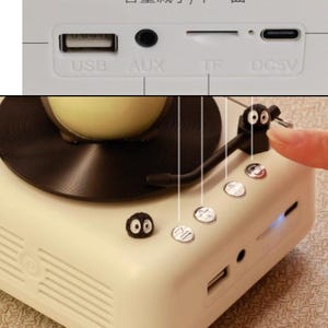 Pu&ograve; includere: Un altoparlante color crema in stile retr&ograve; con un design a giradischi. Include porte USB, AUX, TF e DC5V. L'altoparlante ha diversi pulsanti di controllo e un piccolo personaggio decorativo sul lato.